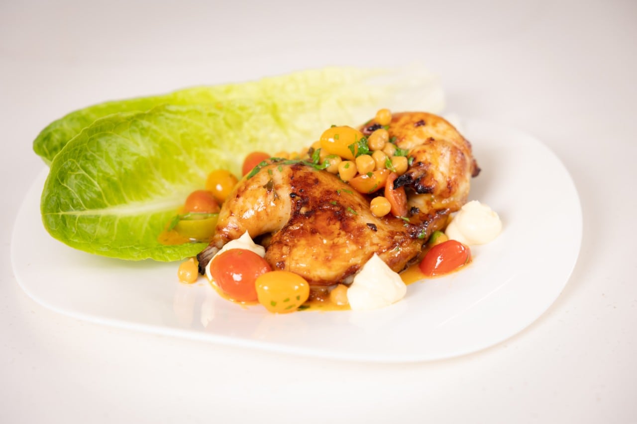 Roast Half Chicken with Buttered Tomatoes, Chickpeas, Orange and Rosemary.
