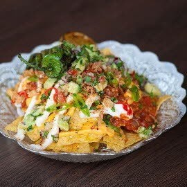 Tortilla Chips and lentil ragout with faux ‘cheese’ vegan mayo and charred poblano pepper Tortilla Chips and lentil ragout with faux ‘cheese’ vegan mayo and charred poblano pepper