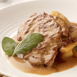 Escalope of Pork fillet with apple and calvados and roasted parsnips (Gluten free)