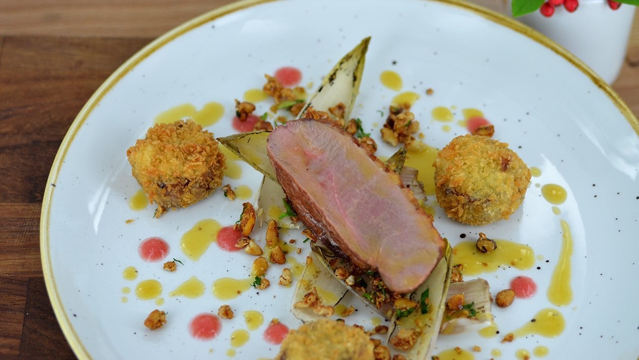 Pan fried duck, croquette with endive and granola