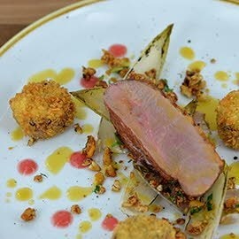 Pan fried duck, croquette with endive and granola Pan fried duck, croquette with endive and granola