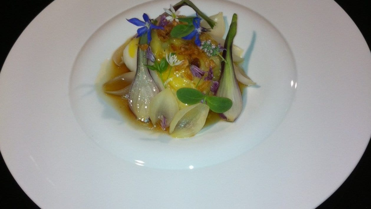 Pan-fried Pollock with Lyonnaise onions, onion consommé