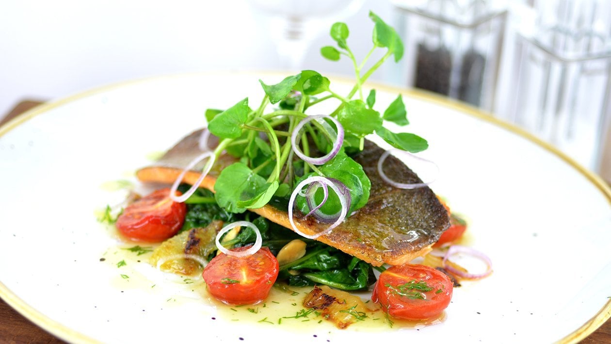 Pan fried trout with almonds, spinach & confit tomatoes