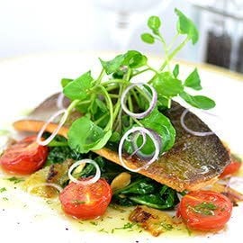 Pan fried trout with almonds, spinach & confit tomatoes Pan fried trout with almonds, spinach & confit tomatoes